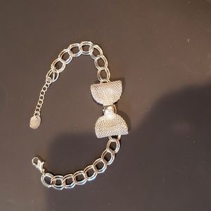 Claire's bow Silvertone bracelet